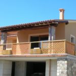 Decorazione e tinteggiatura esterna di villa con terrazza all'Isola d'Elba