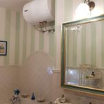 Tinteggiatura e decorazione di bagno con finiture personalizzate all'Isola d'Elba